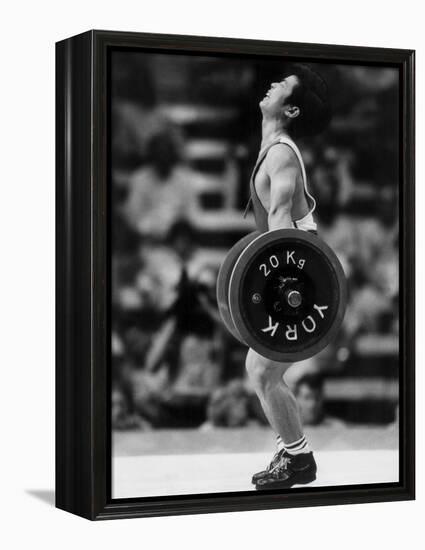 Olympic Games in Los Angeles, 1984 : Weightlifting: Chinese Wu Shude July 30, 1984-null-Framed Stretched Canvas