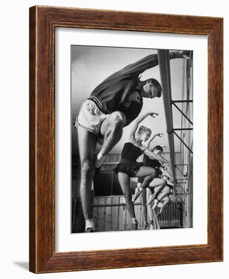 Olympic High Jumper Walter Davis Doing Ballet Exercises in Class of Women Dancers-John Dominis-Framed Premium Photographic Print