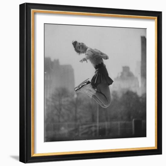 Olympic Skater Carol Heiss Performing on Ice Outdoors at Wollman Memorial Rink in Central Park-Ralph Morse-Framed Premium Photographic Print