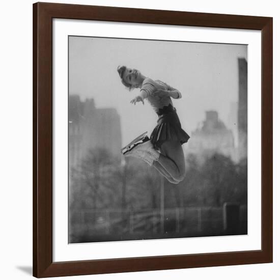 Olympic Skater Carol Heiss Performing on Ice Outdoors at Wollman Memorial Rink in Central Park-Ralph Morse-Framed Premium Photographic Print