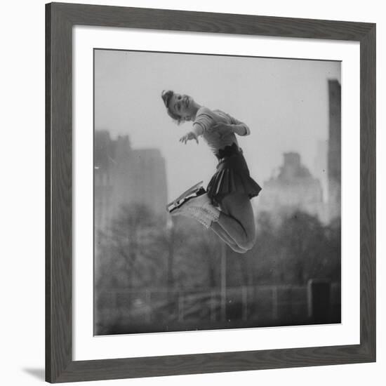 Olympic Skater Carol Heiss Performing on Ice Outdoors at Wollman Memorial Rink in Central Park-Ralph Morse-Framed Premium Photographic Print