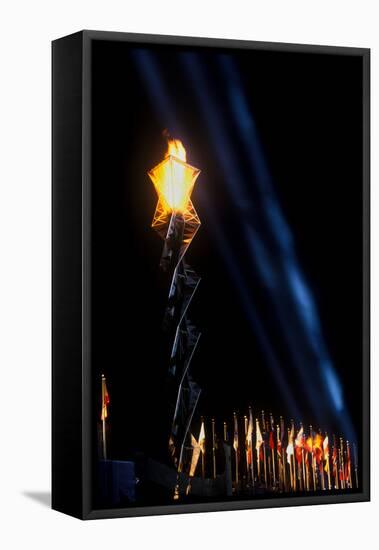 Olympic torch at night during the 2002 Winter Olympics, Salt Lake City, UT-null-Framed Premier Image Canvas