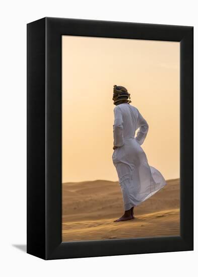 Oman, Wahiba Sands. an Omani Guide Enjoys the Sunset on Sand Dunes in Wahiba Sands.-Nigel Pavitt-Framed Premier Image Canvas