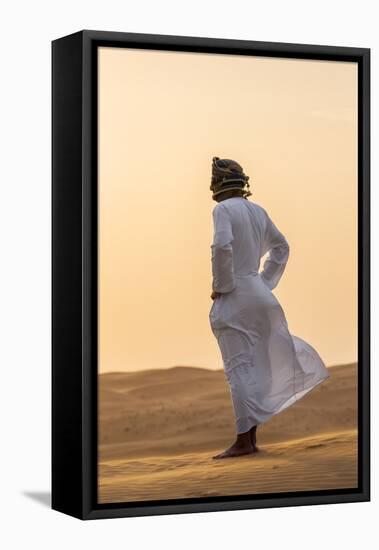 Oman, Wahiba Sands. an Omani Guide Enjoys the Sunset on Sand Dunes in Wahiba Sands.-Nigel Pavitt-Framed Premier Image Canvas