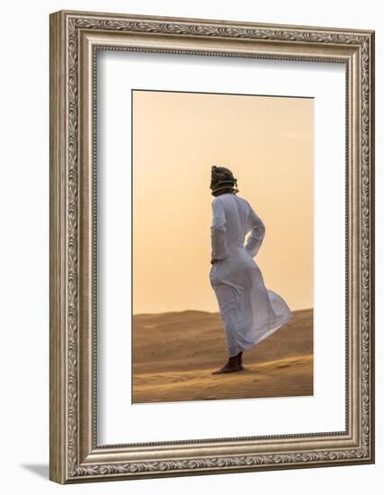 Oman, Wahiba Sands. an Omani Guide Enjoys the Sunset on Sand Dunes in Wahiba Sands.-Nigel Pavitt-Framed Photographic Print