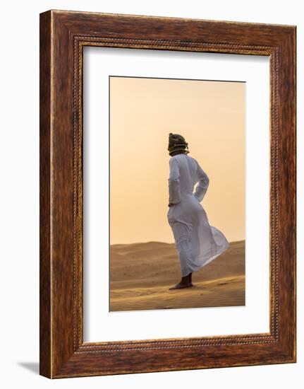 Oman, Wahiba Sands. an Omani Guide Enjoys the Sunset on Sand Dunes in Wahiba Sands.-Nigel Pavitt-Framed Photographic Print