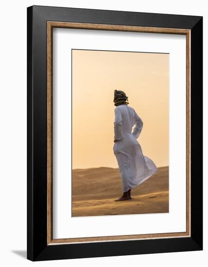 Oman, Wahiba Sands. an Omani Guide Enjoys the Sunset on Sand Dunes in Wahiba Sands.-Nigel Pavitt-Framed Photographic Print