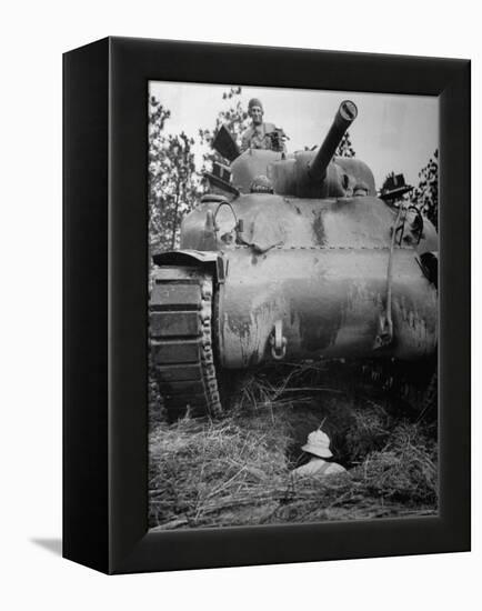 Oncoming View of Tank About to Pass over Foxhole in Which a Soldier is Crouched Down-Myron Davis-Framed Premier Image Canvas
