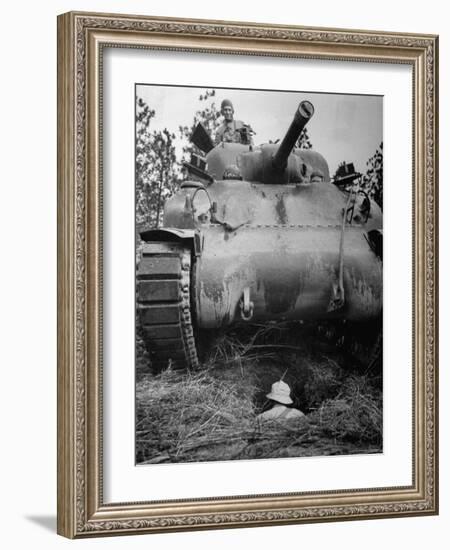 Oncoming View of Tank About to Pass over Foxhole in Which a Soldier is Crouched Down-Myron Davis-Framed Photographic Print