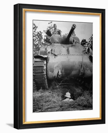 Oncoming View of Tank About to Pass over Foxhole in Which a Soldier is Crouched Down-Myron Davis-Framed Photographic Print