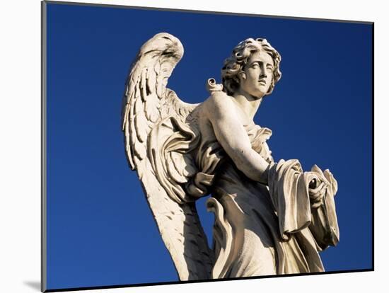 One of Gian Lorenzo Bernini's 17th Century Stone Angels on Ponte Sant'Angelo, Rome, Lazio, Italy-Ruth Tomlinson-Mounted Photographic Print