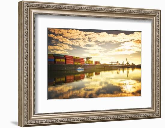 One of Main River's side channels with stacked containers and golden reflections in an industrial s-Andreas Brandl-Framed Photographic Print