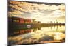 One of Main River's side channels with stacked containers and golden reflections in an industrial s-Andreas Brandl-Mounted Photographic Print