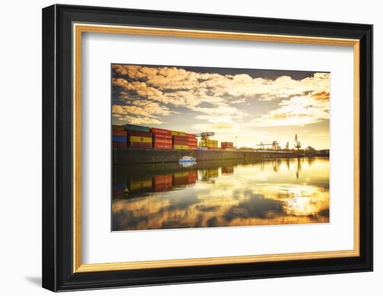 One of Main River's side channels with stacked containers and golden reflections in an industrial s-Andreas Brandl-Framed Photographic Print