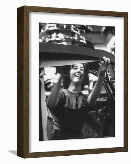 One of the 12% of Women Working on the Assembly Line of a Volkswagen Plant-Paul Schutzer-Framed Photographic Print