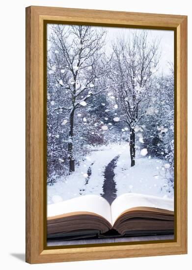 Open Book with Winter Woodland Background and falling Snow-Chris_Elwell-Framed Premier Image Canvas