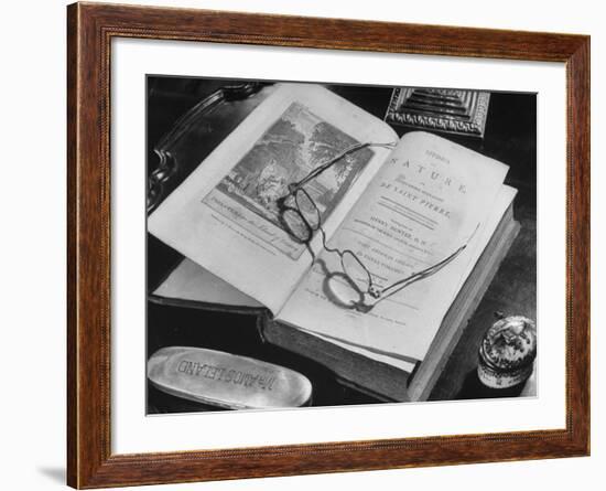 Open Pages of an Old Book, Held Down by a Pair of Steel-Rimmed Spectacles at Mt. Pleasant-null-Framed Photographic Print