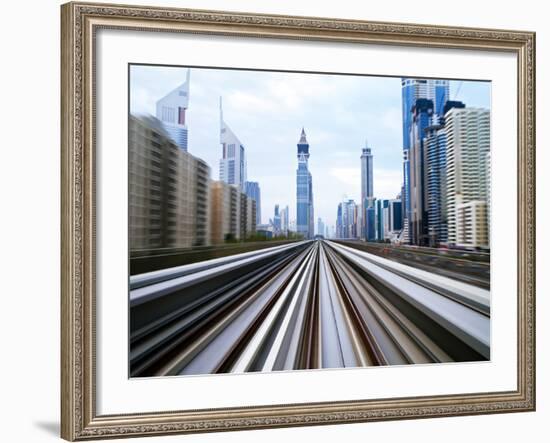 Opened in 2010, the Dubai Metro, Mrt, in Motion Along Sheikh Zayed Road at Dusk, Dubai, United Arab-Gavin Hellier-Framed Photographic Print