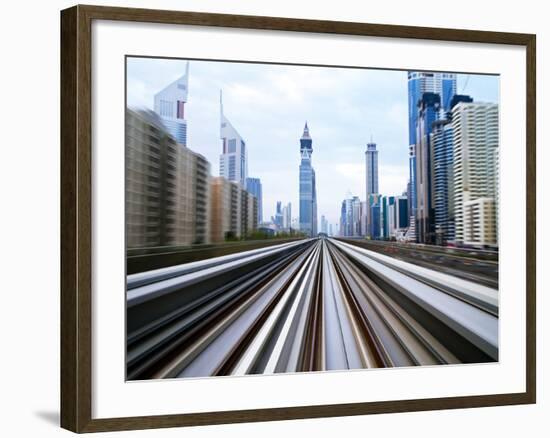 Opened in 2010, the Dubai Metro, Mrt, in Motion Along Sheikh Zayed Road at Dusk, Dubai, United Arab-Gavin Hellier-Framed Photographic Print