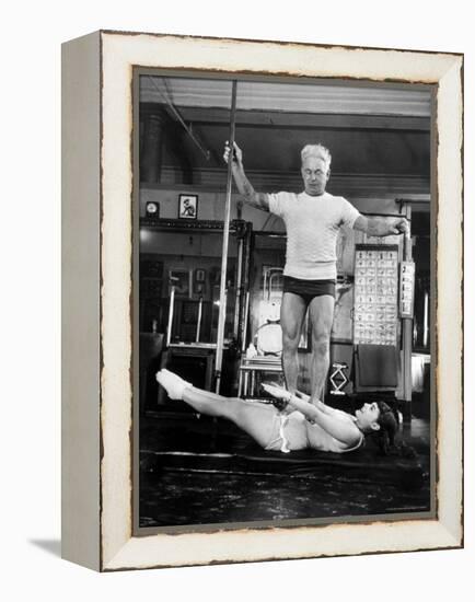 Opera Singer Roberta Peters Balancing Her Trainer, Joseph Pilates, on Her Operatic Breadbasket-Michael Rougier-Framed Premier Image Canvas