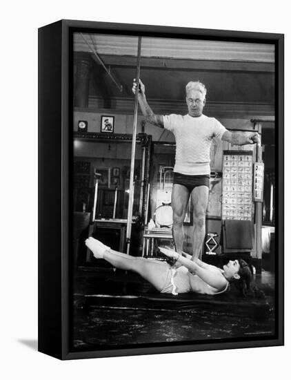 Opera Singer Roberta Peters Balancing Her Trainer, Joseph Pilates, on Her Operatic Breadbasket-Michael Rougier-Framed Premier Image Canvas