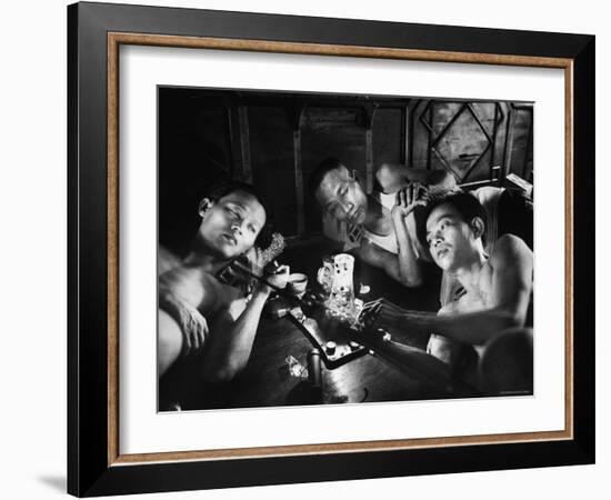 Opium Addicts Smoking, Sleeping, and Talking Together in a Desentoxication Clinic-Jack Birns-Framed Photographic Print