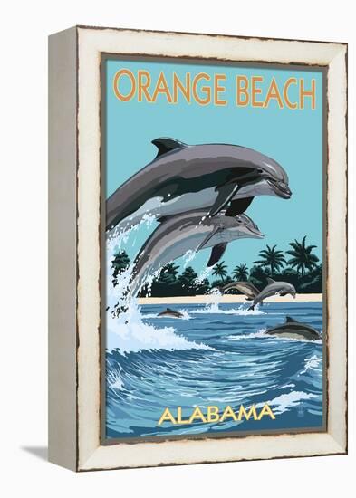 Orange Beach, Alabama - Dolphins Jumping-Lantern Press-Framed Stretched Canvas