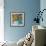 Orange Daisies In Blue Vase-Jane Slivka-Framed Art Print displayed on a wall