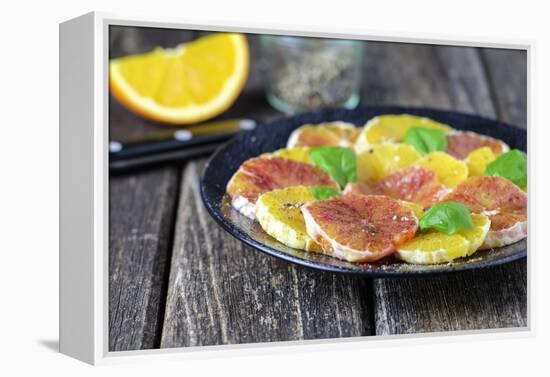 Orange Salad and Blood Orange Salad on Dark Plate-Jana Ihle-Framed Premier Image Canvas