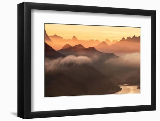 Orange sky at dawn and mist on peaks of Dolomites and Fedaia Pass, Cima Belvedere, Val di Fassa, Tr-Roberto Moiola-Framed Photographic Print