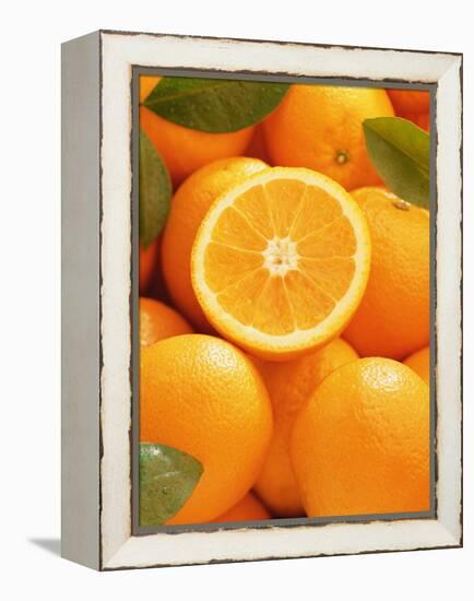 Oranges and Cut Orange, 1996-Norman Hollands-Framed Premier Image Canvas