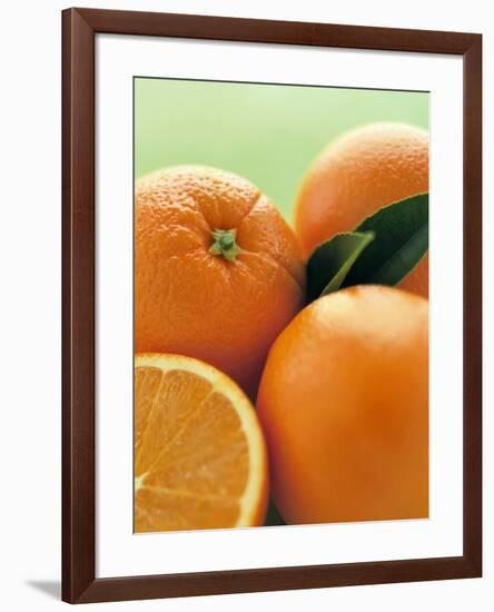 Oranges with Leaves Close Up-Leigh Beisch-Framed Premium Photographic Print