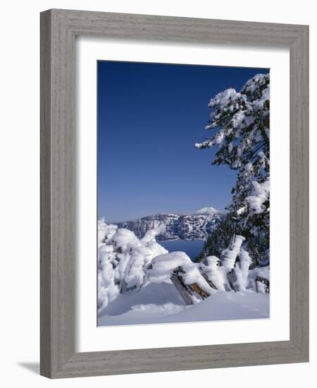 Oregon, Crater Lake National Park. Winter snow accumulates at Crater Lake-John Barger-Framed Photographic Print