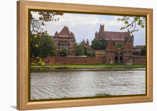 Originally built in the 13th century, Malbork was the castle of the Teutonic Knights-Mallorie Ostrowitz-Framed Premier Image Canvas