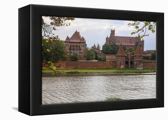 Originally built in the 13th century, Malbork was the castle of the Teutonic Knights-Mallorie Ostrowitz-Framed Premier Image Canvas