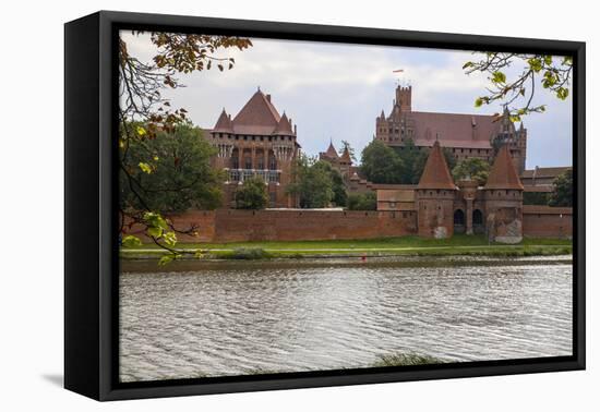 Originally built in the 13th century, Malbork was the castle of the Teutonic Knights-Mallorie Ostrowitz-Framed Premier Image Canvas