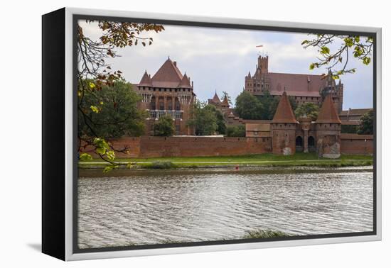 Originally built in the 13th century, Malbork was the castle of the Teutonic Knights-Mallorie Ostrowitz-Framed Premier Image Canvas