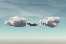 Young Man Relaxes in a Hammock between Two Clouds.-Orla-Photographic Print