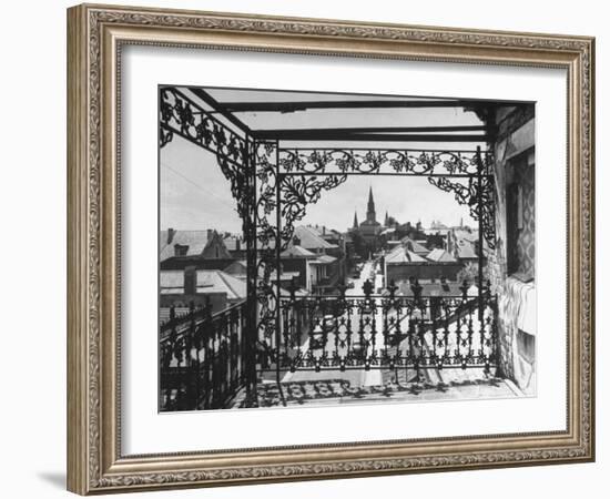 Orleans Street, Center of Old French Quarter of City, Through Grillwork of a Balcony-Andreas Feininger-Framed Photographic Print