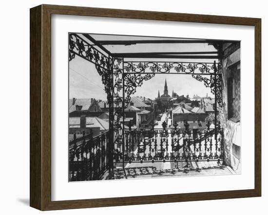 Orleans Street, Center of Old French Quarter of City, Through Grillwork of a Balcony-Andreas Feininger-Framed Photographic Print