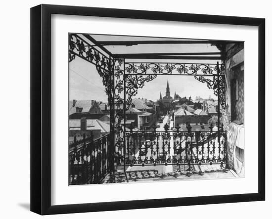 Orleans Street, Center of Old French Quarter of City, Through Grillwork of a Balcony-Andreas Feininger-Framed Photographic Print