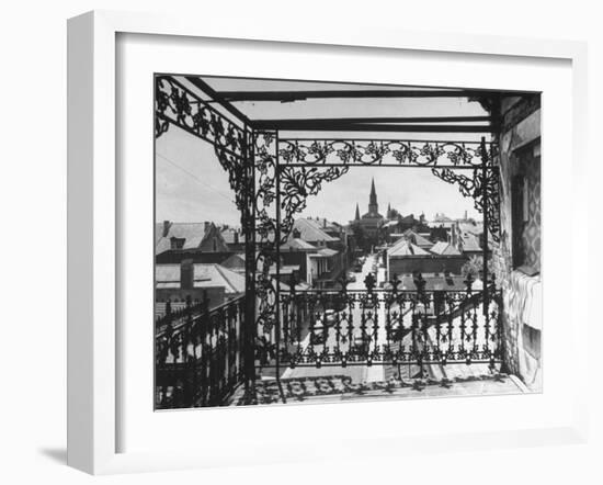 Orleans Street, Center of Old French Quarter of City, Through Grillwork of a Balcony-Andreas Feininger-Framed Photographic Print