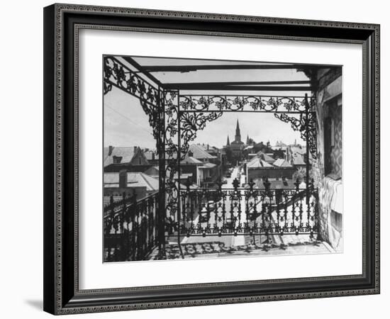 Orleans Street, Center of Old French Quarter of City, Through Grillwork of a Balcony-Andreas Feininger-Framed Photographic Print