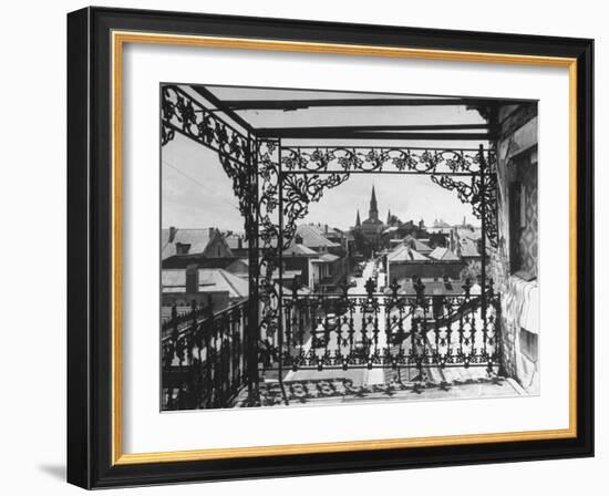 Orleans Street, Center of Old French Quarter of City, Through Grillwork of a Balcony-Andreas Feininger-Framed Photographic Print