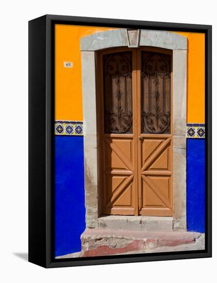 Ornate Wooden Door on Colorful Wall, Guanajuato, Mexico-Julie Eggers-Framed Premier Image Canvas