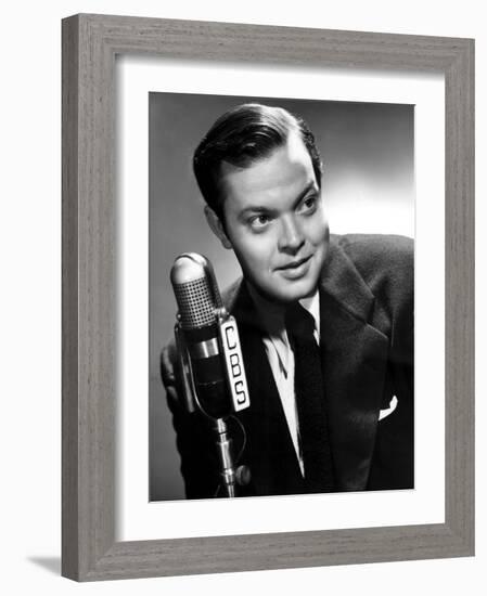 Orson Welles at the CBS Microphone in Publicity Shot for Murcury Summer Theater, 1946-null-Framed Photo