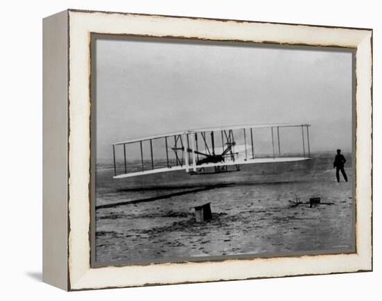 Orville Wright Taking Plane For 1st Motorized Flight as Brother Wilbur Wright Looks at Kitty Hawk-null-Framed Premier Image Canvas