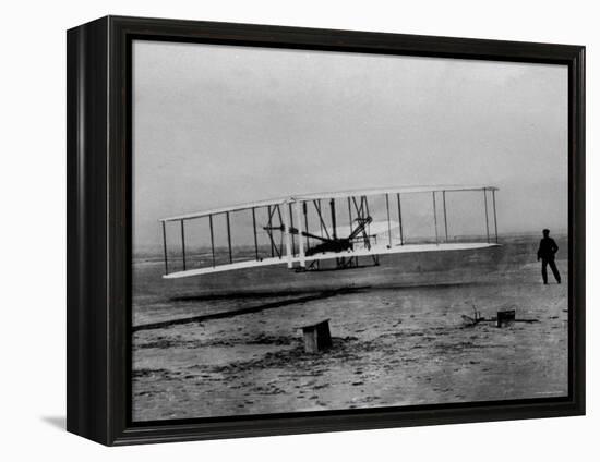 Orville Wright Taking Plane For 1st Motorized Flight as Brother Wilbur Wright Looks at Kitty Hawk-null-Framed Premier Image Canvas