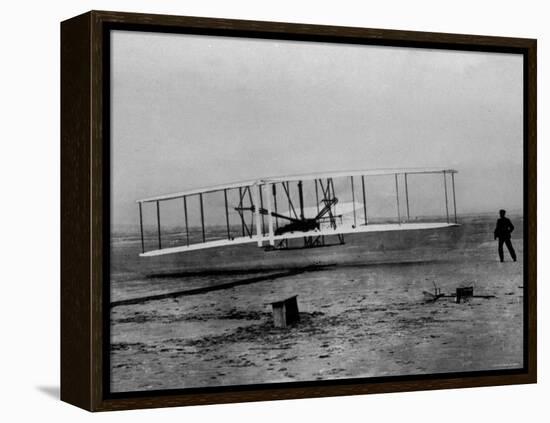 Orville Wright Taking Plane For 1st Motorized Flight as Brother Wilbur Wright Looks at Kitty Hawk-null-Framed Premier Image Canvas
