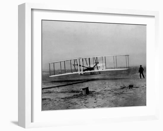 Orville Wright Taking Plane For 1st Motorized Flight as Brother Wilbur Wright Looks at Kitty Hawk--Framed Photographic Print